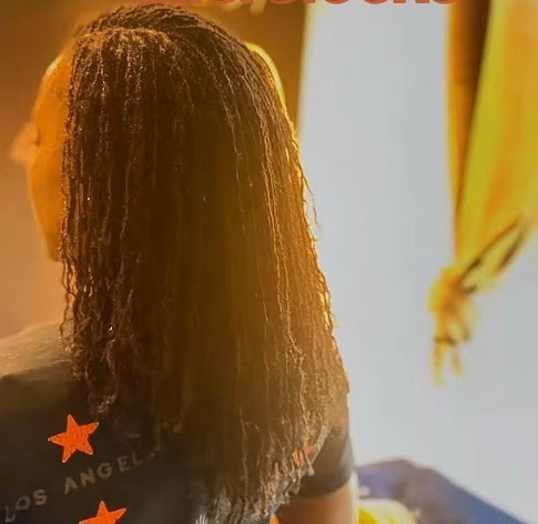 Sisterlocks style on shoulder-length hair। Sisterloc Shop .