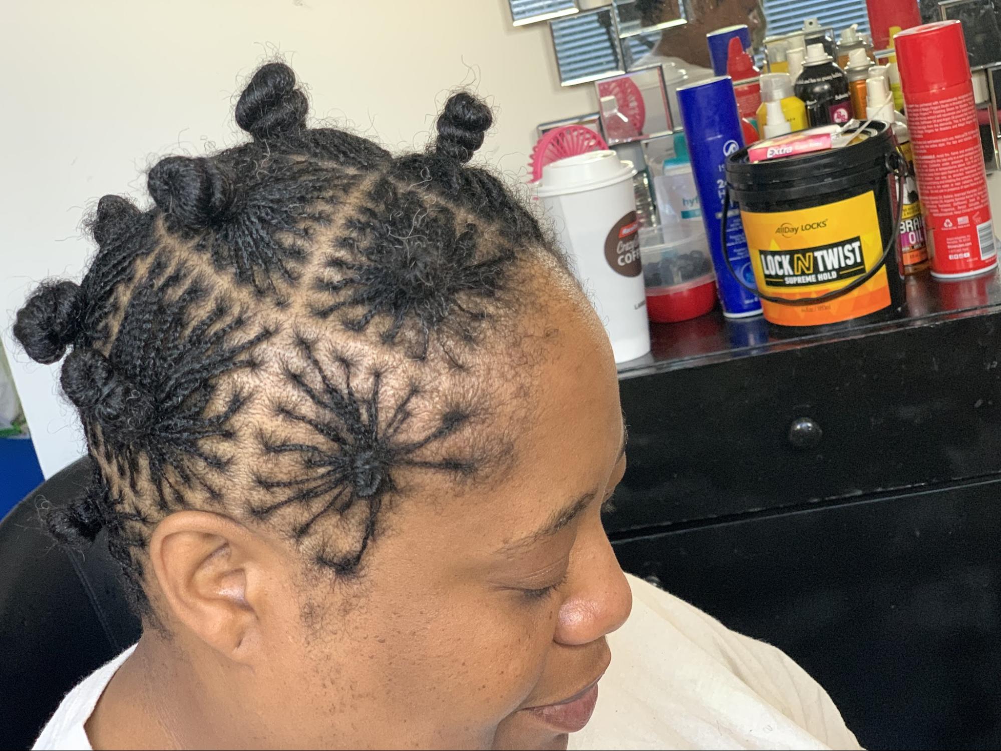 Microlocs styled into small Bantu knots | Sisterloc Shop.